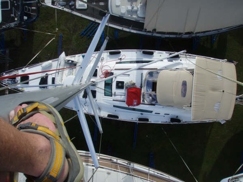 Ian up the mast. © Ian & Andrea Treleaven